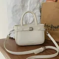 Elegant cream crossbody bag with wrinkled texture and buckle detail for women - Standard Type / Beige