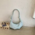 Elegant light blue pleated underarm bag featuring a retro crescent niche design - S / Blue