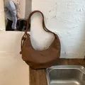 Minimalist vintage brown pleated croissant hobo bag for women with knotted shoulder strap - S / Brown