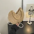 Elegant hand-woven beige conch shell bag featuring a luxury pearl strap for women - Khaki