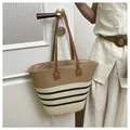 Handwoven striped straw tote bag for summer beach vacation in khaki and cream color - Style 1