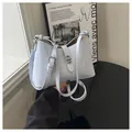 Elegant light blue vintage style bucket bag with adjustable silver straps for women - Blue
