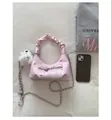 Graziosa borsa rosa con stelle, manico arricciato, fiocco e tracolla a catena in metallo. - Rosa