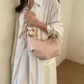 Elegant vintage pleated hobo shoulder bag in soft pink featuring a cute bear charm - L / With Pendant / Pink