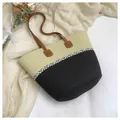 Stylish handmade woven straw tote beach bag in black and beige with geometric pattern band - Style 8