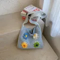 Light blue knitted tote bag with 3D colorful flower appliques for summer vacation - Blue
