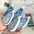 Detail shot of four blue gradient correction tapes held in hands with smooth coverage. - Set Of 5 / Gradient Blue
