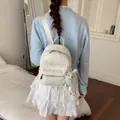 Elegante mochila blanca para mujer con patrones de estrellas y bordado de letras. - S / Blanco