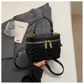 Petit sac boîte noir de créateur pour femme avec détails tressés et fermetures éclair dorées - Noir