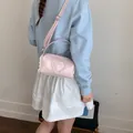 Mini pink cylinder crossbody bag with heart detail and lace trim for women - L / Pink