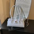 Vintage light blue leather underarm bag with metal lock detail for stylish women's fashion - Without Pendant / Blue