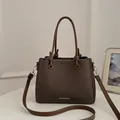 Fashionable brown textured bucket tote bag with knot handles and adjustable strap - Standard Type / Coffee