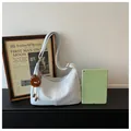 Large capacity light blue hobo shoulder bag with a cute brown monster plush keychain accessory - L / Blue
