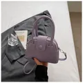Elegante paarse handtas van generfd leer met handvatten en afneembare schouderriem - Alleen Tas / Paars
