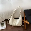 Borsa a tracolla trasformabile in morbida pelle bianco crema e grande zaino minimalista - modello base / Bianco