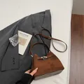 Sophisticated brown textured fabric and leather commuter bucket bag with silver clasp - Without Pendant / Brown