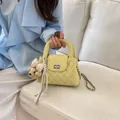 Trendy yellow quilted chain handbag for women with a cute plush bear keychain accessory - Pink Bow Plush Teddy Bear Charm / Yellow