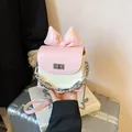 Stylish mini pink and cream woven crossbody bag featuring a cute bow and silver chain - S / Pink Small