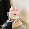 Elegant mini pink bow crossbody bag featuring woven texture and silver chain strap - White Small