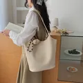 Stylish vintage cream woven tote bag with large capacity for female commuter fashion - White With Charm / White