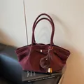 Elegant vintage pleated tote bag in deep burgundy with decorative fur pom-pom tassel for women - Pendant Style / Burgundy