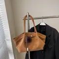 Vintage brown pleated tote bag with faux fur charm for women's chic commuting style. - Pendant Style / Brown