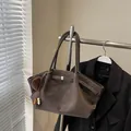 Large dark brown retro pleated tote bag with faux suede texture and fur ball charm - Pendant Style / Coffee