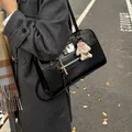 Premium black commuter shoulder bag for women featuring a cute white plush dog charm - With Pendant / Black