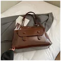 Vintage large brown commute tote bag with glossy finish and front pocket detail - No Pendant / Dark Brown