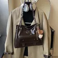 Large capacity retro tote bag in glossy dark brown with chain strap and stylish pendants - With Pendant / Coffee