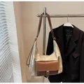 Large capacity beige hobo shoulder bag with a brown front pocket and buckle detail - Off White
