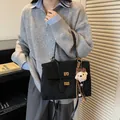 Elegant black frosted crossbody bag with retro gold locks and a cute bear charm. - With Charm / S / Black