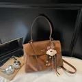 Brown suede retro tote bag with plush bear charm, stylish commuter crossbody shoulder bag - With Charm / S / Brown
