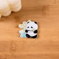 Adorable cartoon panda acrylic fridge magnet with traditional kite design on wood - Kite Flying