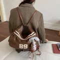 Zaino multifunzionale in pelle marrone vintage con strisce e numero 89 - con portachiavi / Marrone