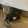 Vintage black suede leopard print crossbody bag with a cute cartoon patch detail - Black
