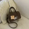 Retro dark brown suede leopard print Boston handbag featuring a cute plush biscuit charm - Coffee With Rabbit Pendant