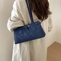 Elegante blaue Vintage-Schultertasche aus Wildlederimitat mit großem Fassungsvermögen. - Blau