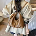 Large brown faux leather convertible backpack tote bag for women with teddy bear charm - Yellowish Brown With Charm Style (XCY56808)