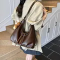Versatile large capacity dark brown leather backpack and tote bag for women commuting - Coffee With Charm Style (XCY56808)