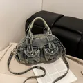 Vintage acid-washed denim Boston bag with front pockets and adjustable straps - Black