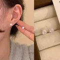 Sparkly round-cut cubic zirconia stud earrings for women with elegant silver-tone finish - White Fireworks Screw - 6mm (A2802)