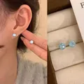 Sparkling light blue round zircon stud earrings for women with elegant silver-tone setting - Blue Fireworks Screw - 6mm (A2802)