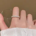 Elegant French Baroque silver ring with sparkling micro-inlaid zircons on finger - Textured Pave Band Ring (J1114) / Silver Style A