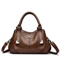 Elegant dark brown soft leather handbag with kangaroo logo and three spacious compartments. - Brown