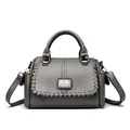 Elegant grey textured leather handbag with top handle and detachable shoulder strap - Gray