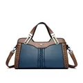 Borsa a tracolla in ecopelle blu e marrone con dettagli intrecciati e tracolla. - Modello in Contrasto / Blu