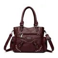 Elegant burgundy faux leather tote bag with silver studs and adjustable shoulder strap - Burgundy