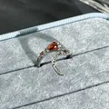 Elegant pomegranate red teardrop open ring with silver finish presented in a velvet jewelry box - Style 3 Adjustable Ring