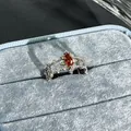Elegant silver crown ring featuring a marquise orange gemstone and pavé accents - Style 5 Adjustable Ring